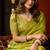 Parrot green heavy tissue allover cow woven butta with tassels saree with blouse