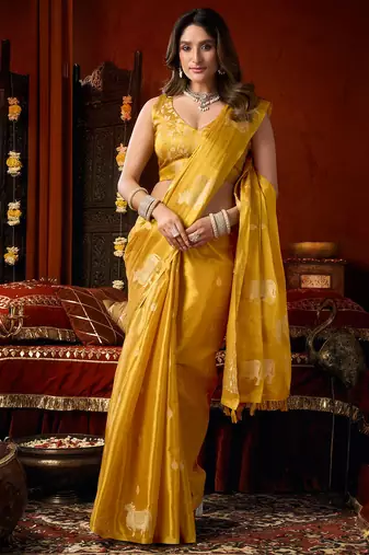 Mustard heavy tissue allover cow woven butta with tassels saree with blouse