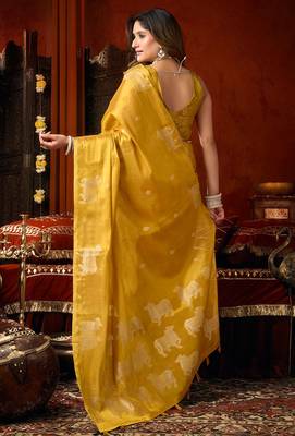 Mustard heavy tissue allover cow woven butta with tassels saree with blouse 4