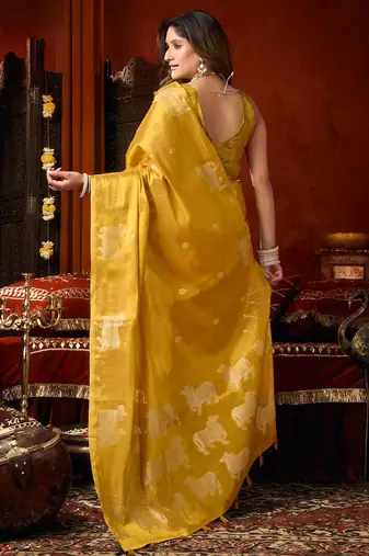 Mustard heavy tissue allover cow woven butta with tassels saree with blouse
