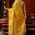 Mustard heavy tissue allover cow woven butta with tassels saree with blouse