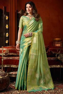 Sea green heavy tissue allover cow woven butta with tassels saree with blouse 1