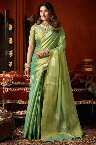 Sea green heavy tissue allover cow woven butta with tassels saree with blouse