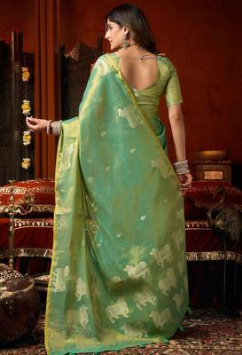 Sea green heavy tissue allover cow woven butta with tassels saree with blouse 4