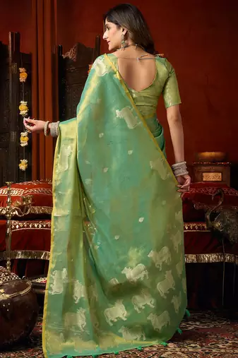 Sea green heavy tissue allover cow woven butta with tassels saree with blouse