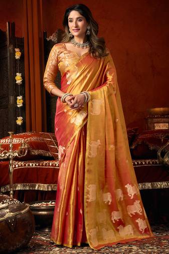 Orange heavy tissue allover cow woven butta with tassels saree with blouse