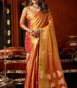 Orange heavy tissue allover cow woven butta with tassels saree with blouse