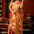 Orange heavy tissue allover cow woven butta with tassels saree with blouse