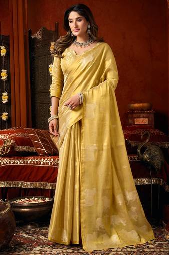 Yellow heavy tissue allover cow woven butta with tassels saree with blouse