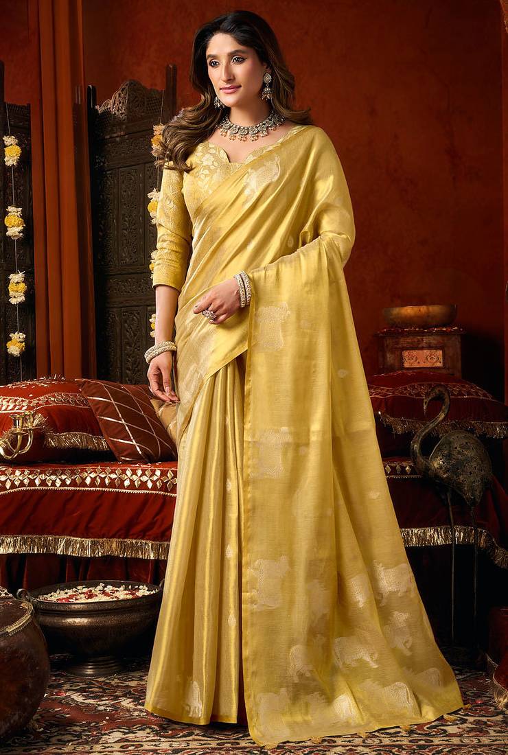 Yellow heavy tissue allover cow woven butta with tassels saree with blouse