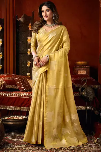 Yellow heavy tissue allover cow woven butta with tassels saree with blouse