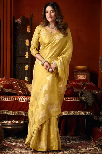 Yellow heavy tissue allover cow woven butta with tassels saree with blouse