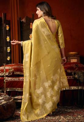 Yellow heavy tissue allover cow woven butta with tassels saree with blouse 4