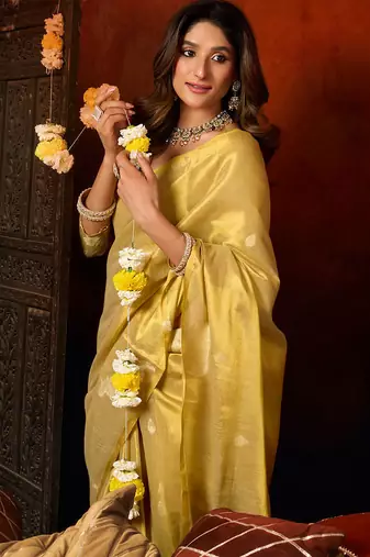 Yellow heavy tissue allover cow woven butta with tassels saree with blouse
