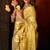 Yellow heavy tissue allover cow woven butta with tassels saree with blouse