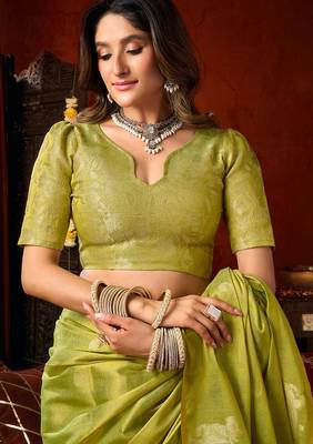 Parrot green heavy tissue allover cow woven butta with tassels saree with blouse 6