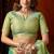 Sea green heavy tissue allover cow woven butta with tassels saree with blouse