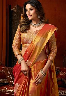 Orange heavy tissue allover cow woven butta with tassels saree with blouse 6