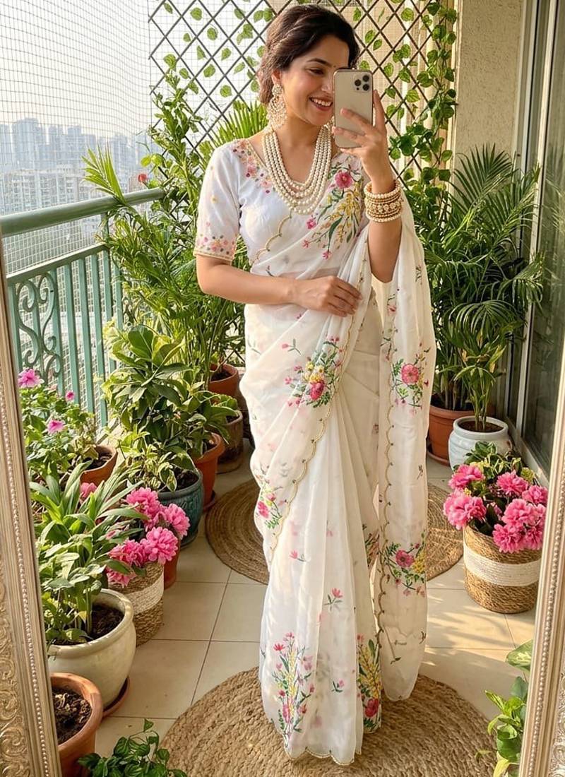 White taby silk blend with amazing floral print with hand work khatli saree with blouse