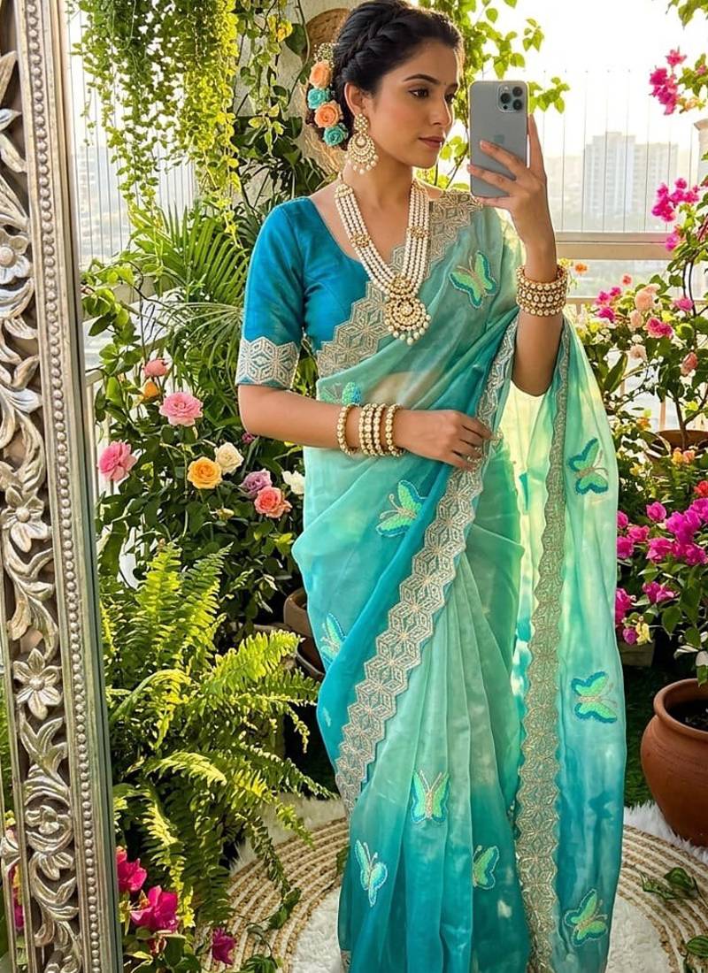 Multicolor silk blend padding with hand towel work butterfly butta saree with blouse