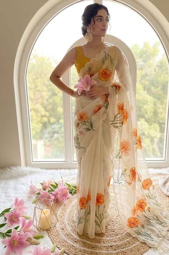 Offwhite taby silk blend with digital print and cutdana moti work saree with blouse