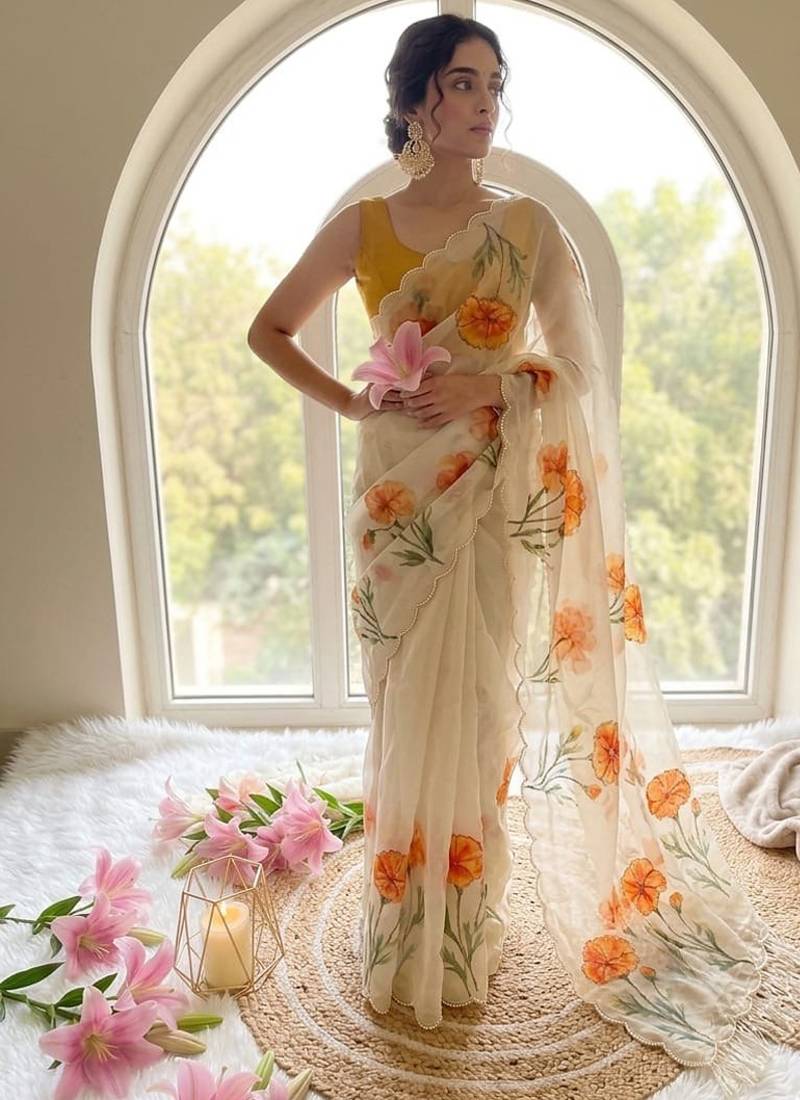Offwhite taby silk blend with digital print and cutdana moti work saree with blouse
