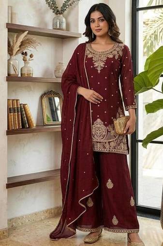 Red embroidered readymade suit