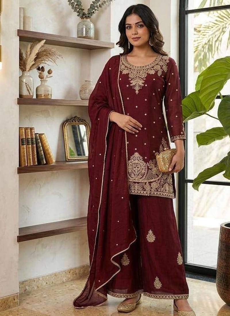 Red embroidered readymade suit