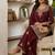 Red embroidered readymade suit
