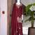 Red embroidered readymade suit