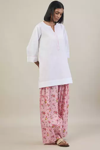 Stark white cotton kurta set with pink dupatta