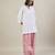 Stark white cotton kurta set with pink dupatta