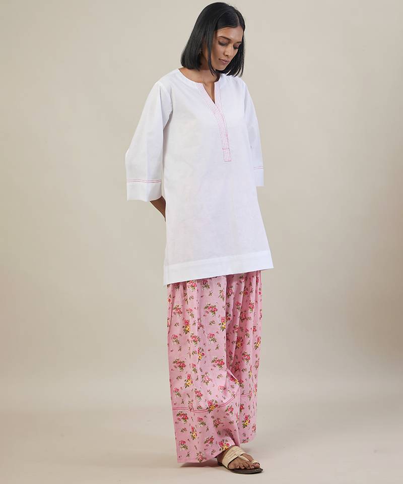 Stark white cotton kurta set with pink dupatta