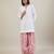 Stark white cotton kurta set with pink dupatta