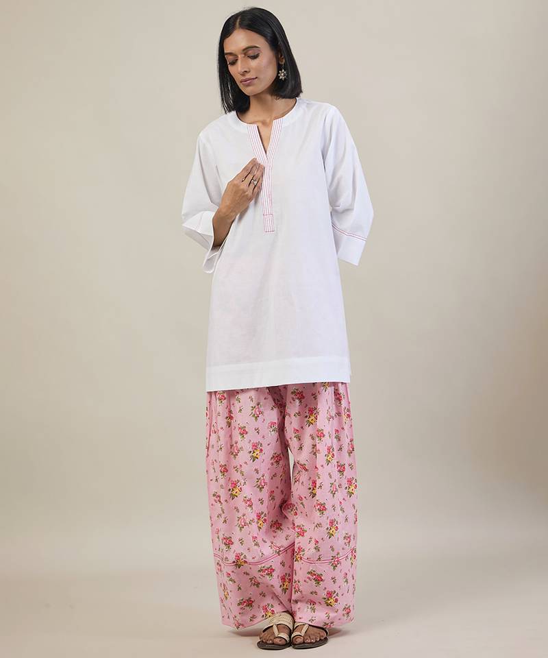 Stark white cotton kurta set with pink dupatta