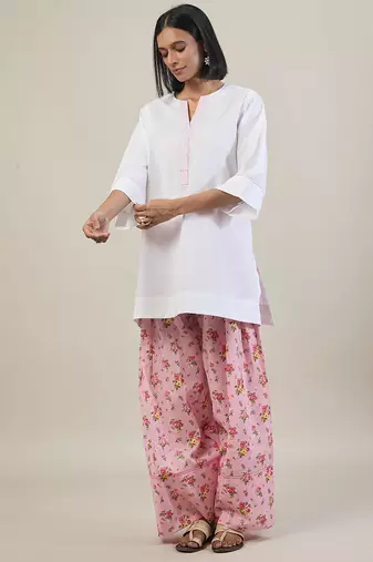 Stark white cotton kurta set with pink dupatta