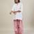 Stark white cotton kurta set with pink dupatta