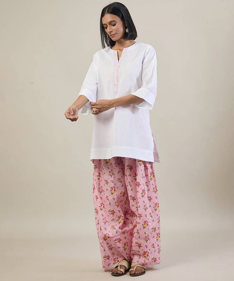 Stark white cotton kurta set with pink dupatta