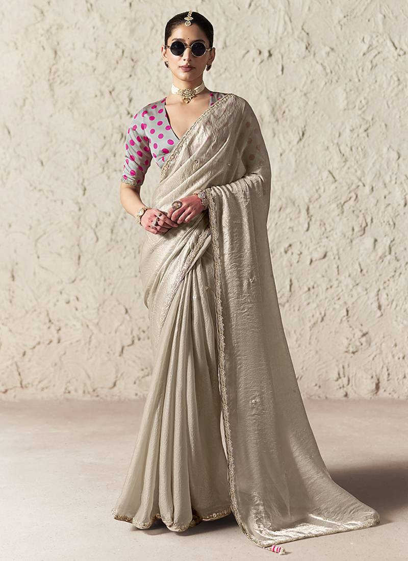 light beige tissue glass saree with blouse