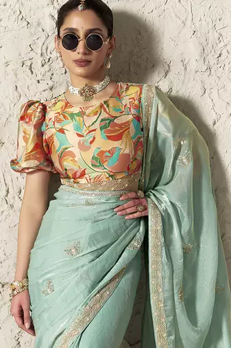 light sky blue tissue glass saree with blouse