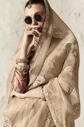 beige tissue glass saree with blouse