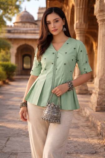 Women mint green embroidered peplum top