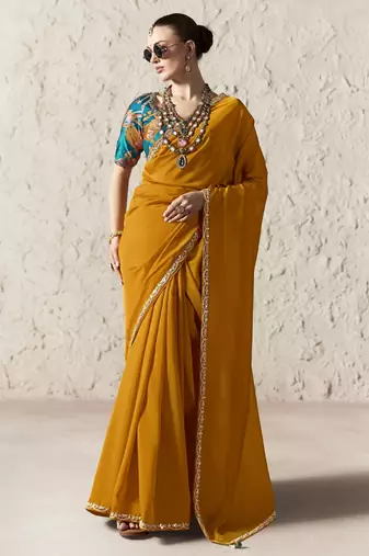  ORANGE FANCY embroidered saree with blouse