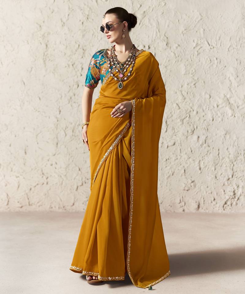 ORANGE FANCY embroidered saree with blouse