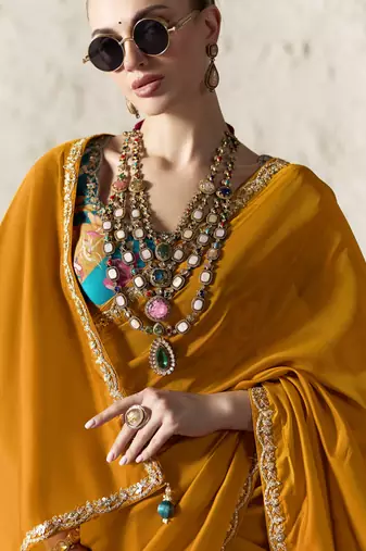  ORANGE FANCY embroidered saree with blouse