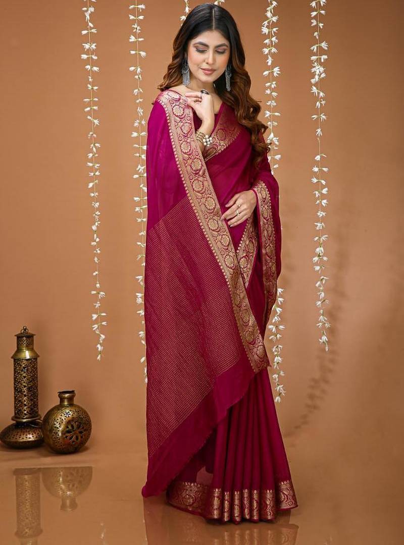 magenta chinnon silk blend plain woven border saree with blouse