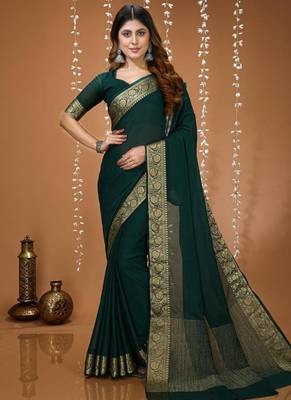 green chinnon silk blend plain woven border saree with blouse 1