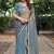 blue chiffon embroidered border saree with embroidered blouse