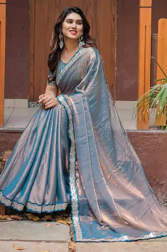 blue chiffon embroidered border saree with embroidered blouse