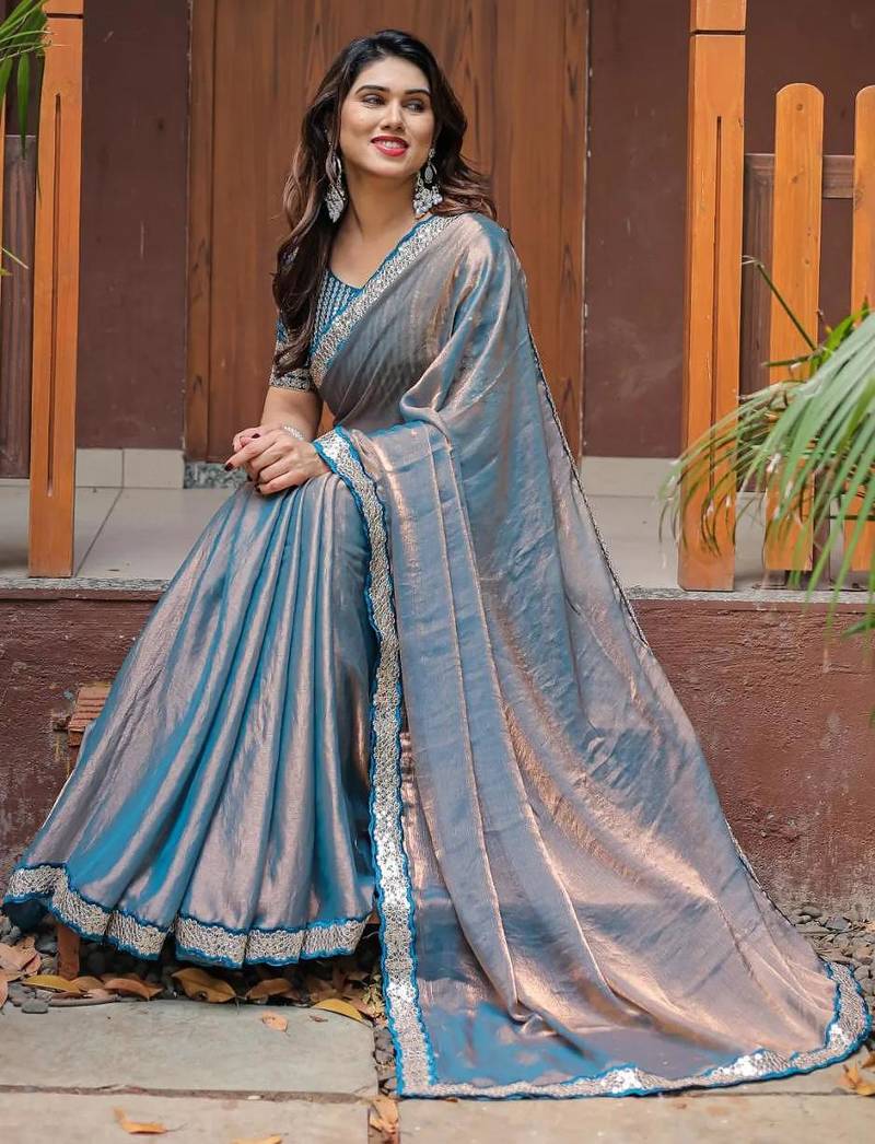 blue chiffon embroidered border saree with embroidered blouse
